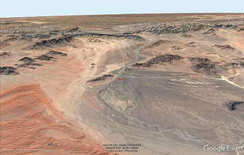 Cadre morphologique du canyon de Sesriem (flèche rouge au centre de l'image), Namibie