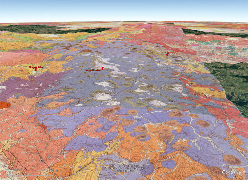 Vue oblique de la carte géologique localisant la ville du Puy-en-Velay dans la haute vallée de la Loire à l'Est, le lac du Bouchet au milieu du plateau basaltique du Devès, et les gorges de l'Allier (à l'Ouest)