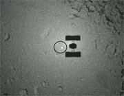 Ombre de la sonde Hayabusa sur l'astéroïde Itokawa