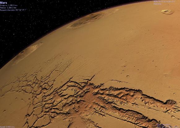 Vue de Valles Marineris sur fond de volcans martiens